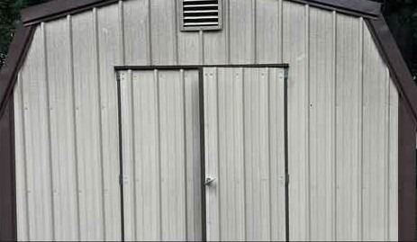 Metal shed before cleaning