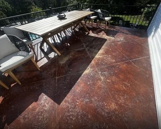 Acid-stained patio before cleaning