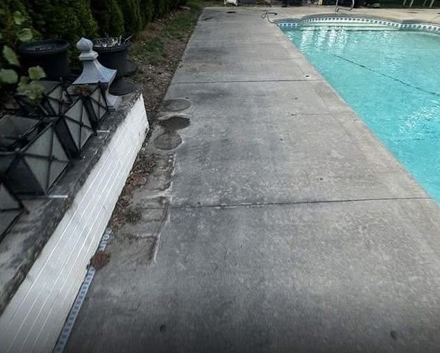 Pool deck before cleaning
